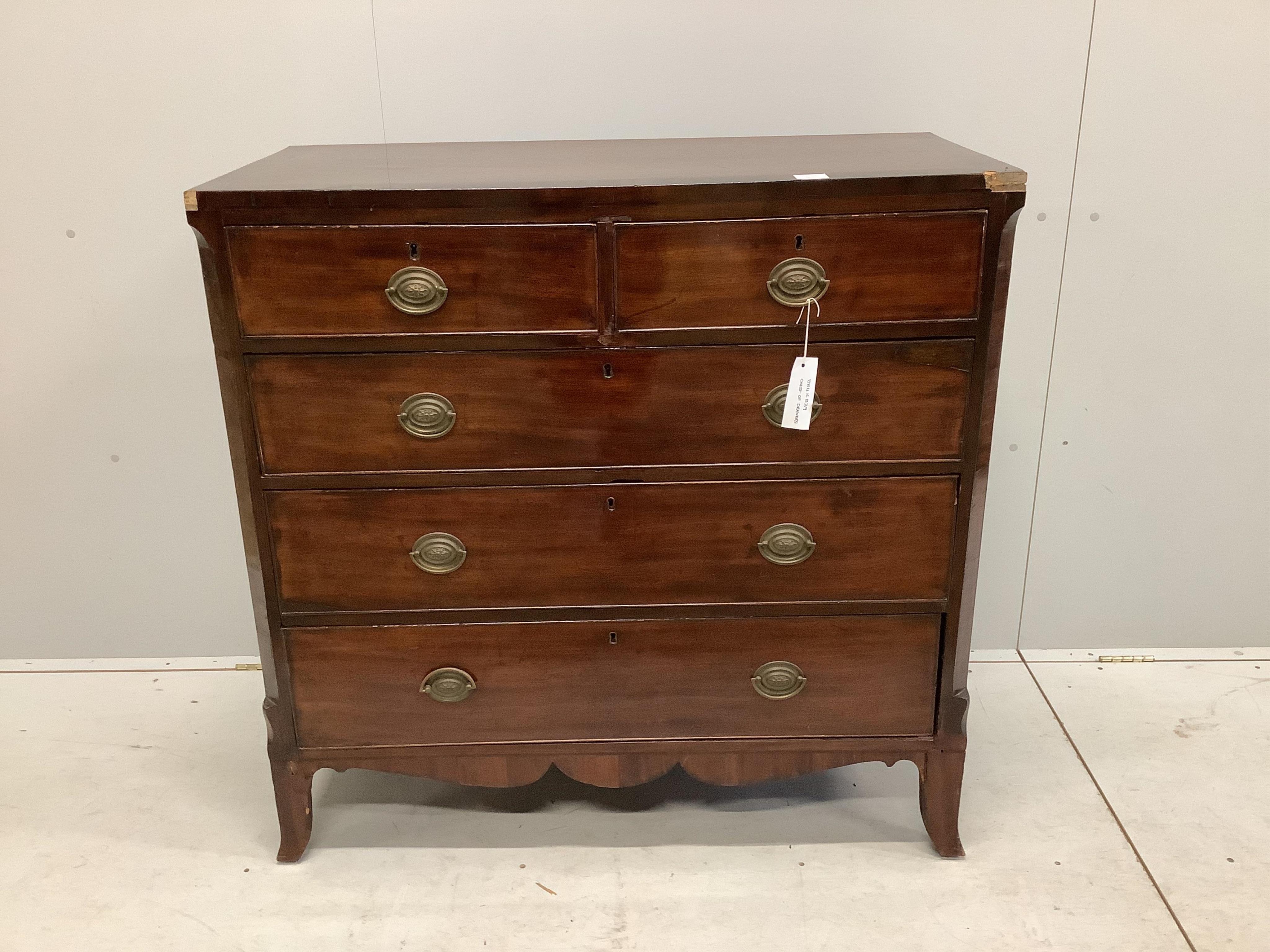 An early Victorian crossbanded mahogany chest of two short and three long drawers, with brass oval loop handles, width 105cm, depth 48cm, height 104cm. Condition - poor to fair